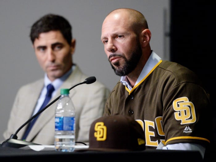 Oct 31, 2019; San Diego, CA, USA; San Diego Padres manager Jayce Tingler (right) is introduced as general manager A.J. Preller looks on at Petco Park. Mandatory Credit: Orlando Ramirez-USA TODAY Sports